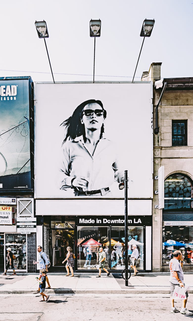 photo of billboard of woman in black and white