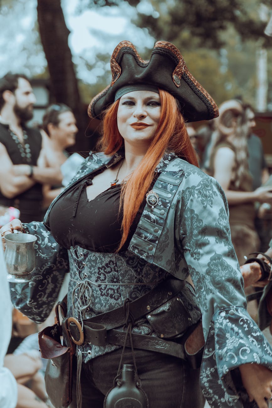 woman posing in pirate costume