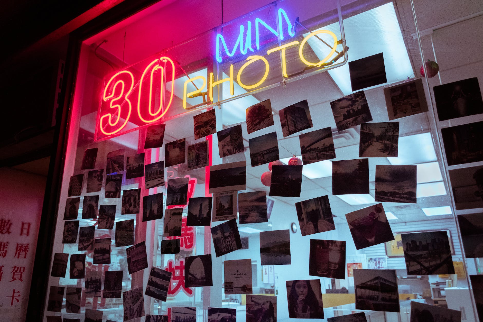 photo of neon signage with pictures